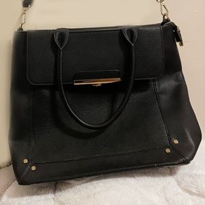 Charming Charlie Black and Gold Plated Buckle Bag